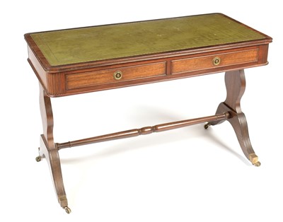 Lot 883 - Edwardian mahogany library table