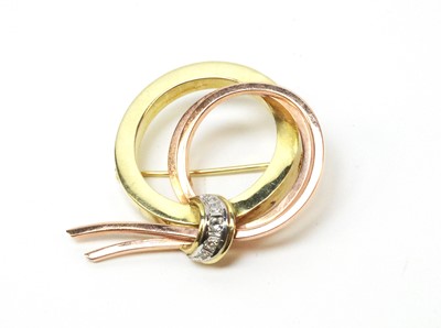 Lot 4 - Mid 20th C yellow and rose coloured metal and diamond brooch.