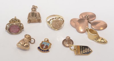 Lot 179 - Gold cufflinks and charms