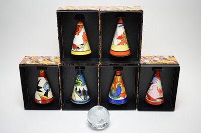 Lot 207 - Six boxed Wedgwood Clarice Cliff sugar castors; and a paperweight.