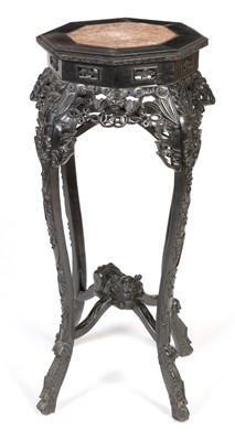 Lot 884 - Chinese carved hardwood octagonal jardiniere stand.