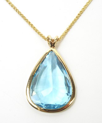 Lot 92 - A blue topaz pendant.