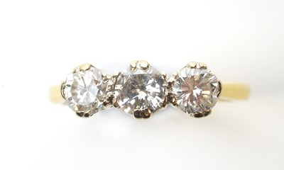 Lot 95 - A three-stone diamond ring.