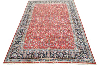Lot 638 - A fine signed Kashan carpet
