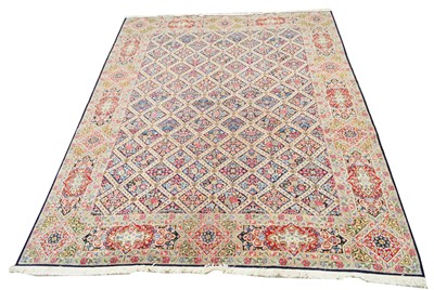 Lot 648 - Antique Kirman carpet