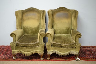 Lot 63 - Pair of early 20th C wing back armchairs.