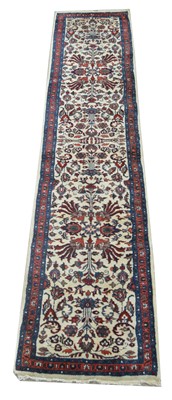 Lot 741 - Sarough Mahal runner, the gold floral design...