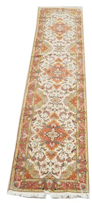 Lot 382 - A fine part silk Tabriz runner