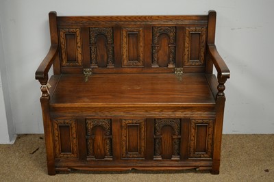 Lot 42 - 20th C oak hall settle.