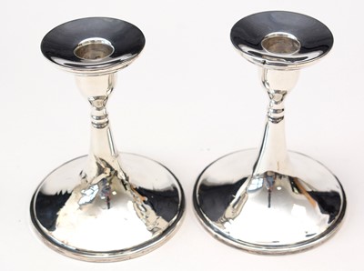 Lot 205 - Pair of silver candlesticks.
