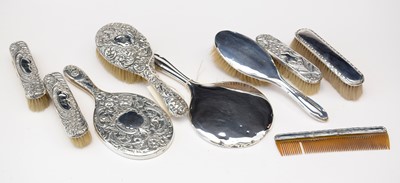 Lot 210 - Silver-backed dressing table items.