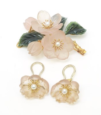 Lot 60 - A mid 20th C Austrian carved quartz and nephrite floral pattern brooch and earrings.