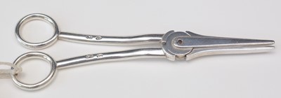Lot 184 - Victorian silver grape scissors.
