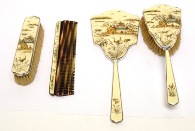 Lot 201A - A George V silver and enamel Japonisme dressing table set