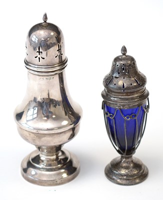 Lot 222 - Two silver sugar casters.