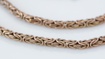 Lot 157 - A 9ct. yellow gold necklace.