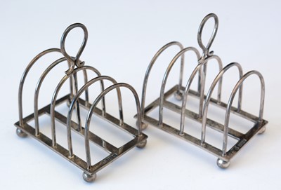 Lot 262 - Pair of silver five bar toast racks.