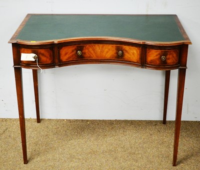 Lot 27 - 20th C mahogany writing table.
