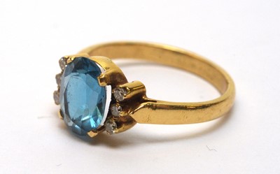 Lot 228 - Topaz and diamond ring