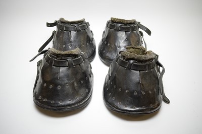 Lot 529 - A set of four early 20th Century horse shoe covers