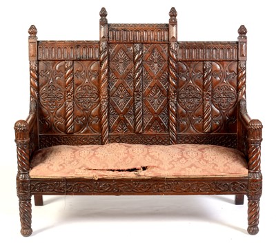 Lot 610 - Victorian oak carved settee
