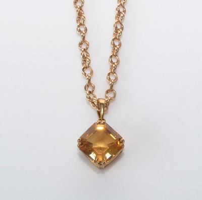 Lot 211 - A citrine pendant.