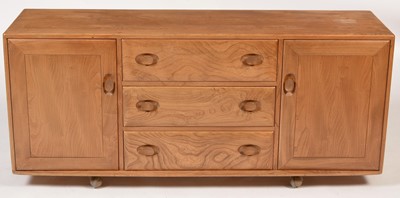 Lot 865 - Ercol: a Windsor sideboard in elm.