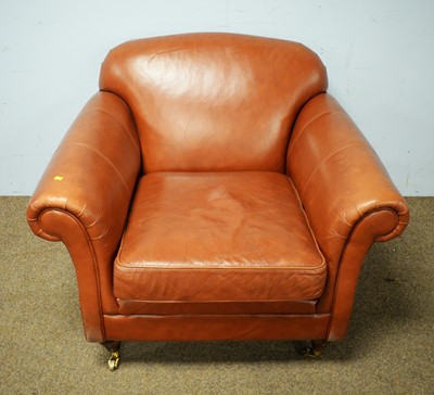Lot 66 - Tanned leather upholstered open armchair.