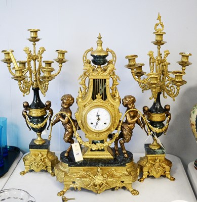 Lot 248 - An Italian three piece clock garniture.