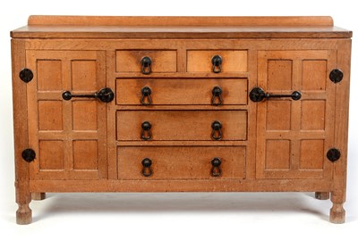 Lot 603 - Robert 'Mouseman' Thompson of Kilburn: an oak mid Century sideboard