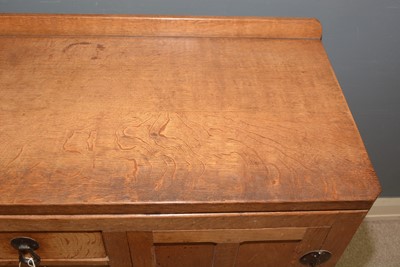 Lot 603 - Robert 'Mouseman' Thompson of Kilburn: an oak mid Century sideboard