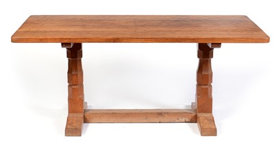 Lot 653 - Mid 20th Century Robert 'Mouseman' Thompson oak dining table