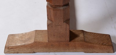 Lot 653 - Mid 20th Century Robert 'Mouseman' Thompson oak dining table