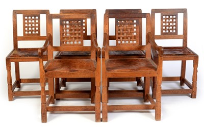 Lot 654 - Set of six mid 20th Century Robert 'Mouseman' Thompson oak dining chairs