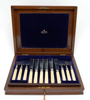 Lot 156 - A Victorian canteen of twelve silver and ivory handled fish knives and forks
