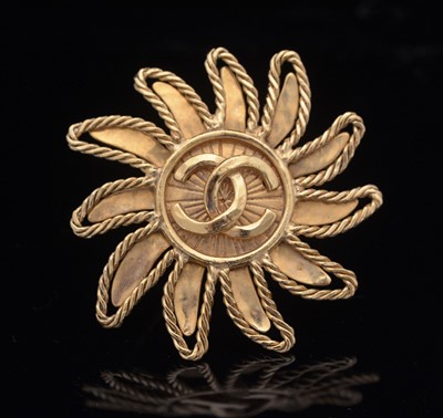 Lot 755 - Chanel: gilt metal sun brooch