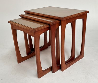 Lot 878 - Mid-Century nest of three teak tables