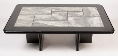 Lot 869 - An ebonised and tiled coffee table.