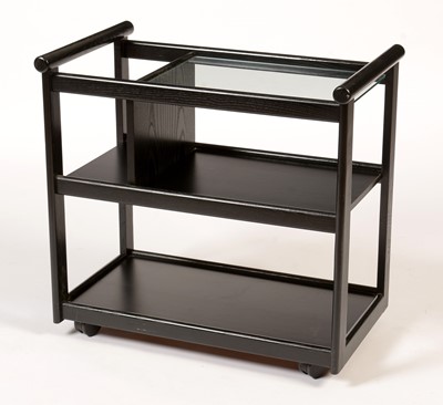 Lot 847 - An ebonised three-tier trolley.