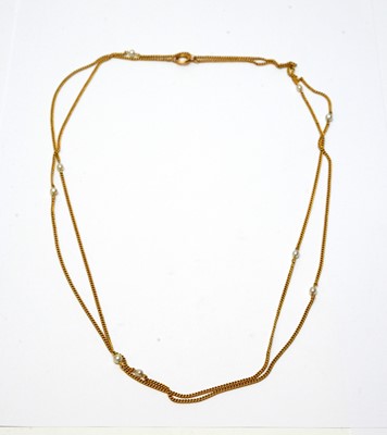 Lot 28 - A yellow metal and pearl chain necklace