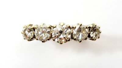 Lot 5 - A five stone diamond ring