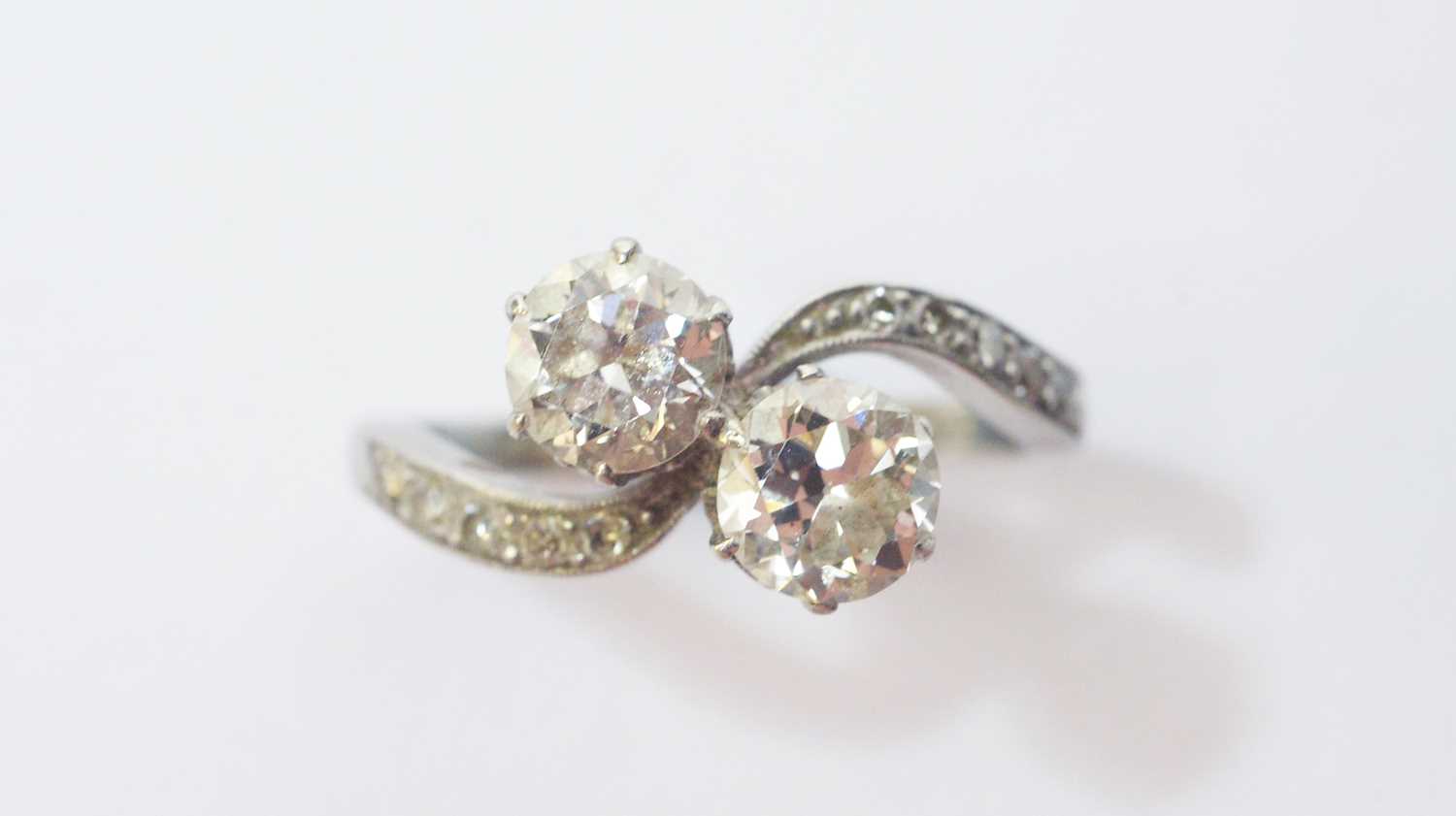 Lot 29 - A two stone diamond ring