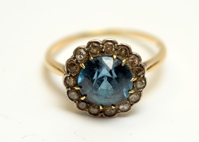 Lot 139 - A diamond and synthetic spinel flowerhead cluster ring.