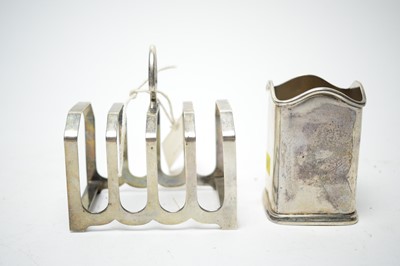 Lot 175 - Silver bottle stand and toast rack