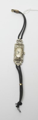 Lot 203 - A diamond cocktail watch.