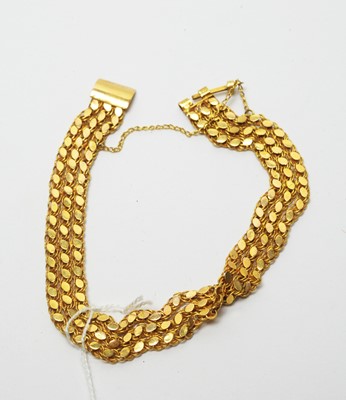 Lot 206 - A yellow metal bracelet.