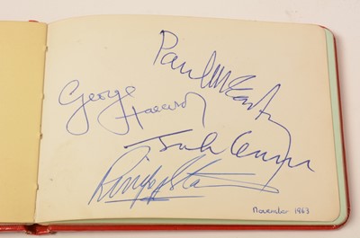 Lot 1344 - A collection of autographs including the Beatles and Roger Moore