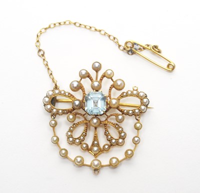 Lot 61 - An Edwardian aquamarine and seed pearl brooch