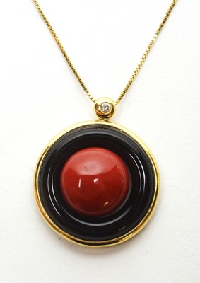 Lot 64 - A coral and onyx pendant