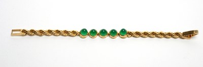 Lot 86 - A chrysoprase and gold bracelet
